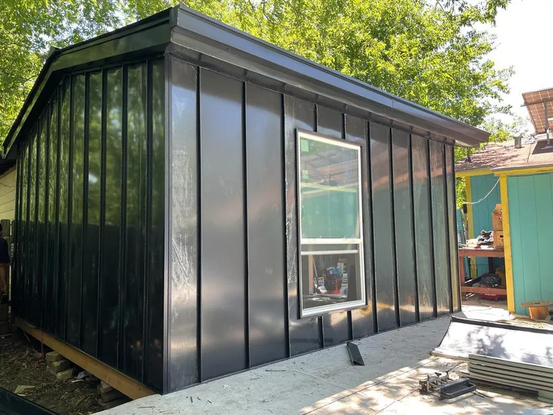 Black standing seam metal wall panels for Roof Inspection in Burke Centre