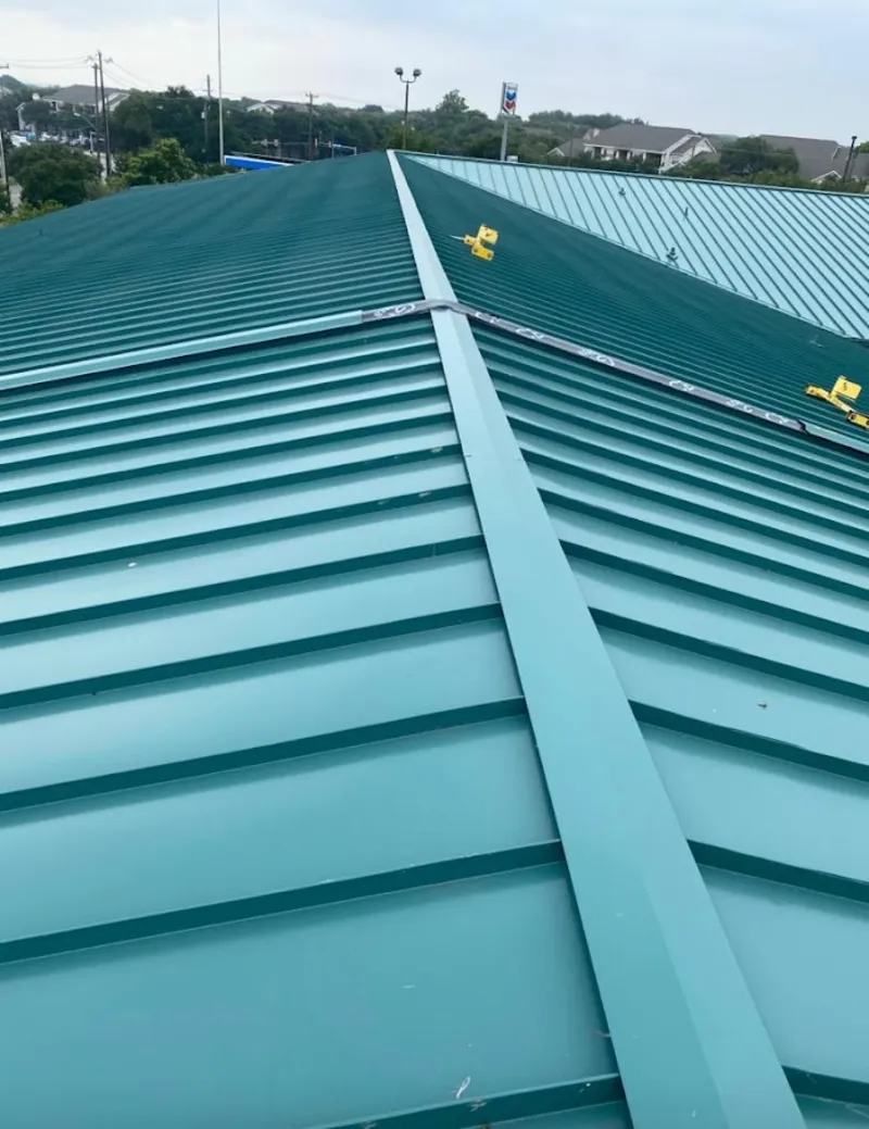 Green commercial metal roof ridge and valley for Metal Roof Repair in Burke Centre